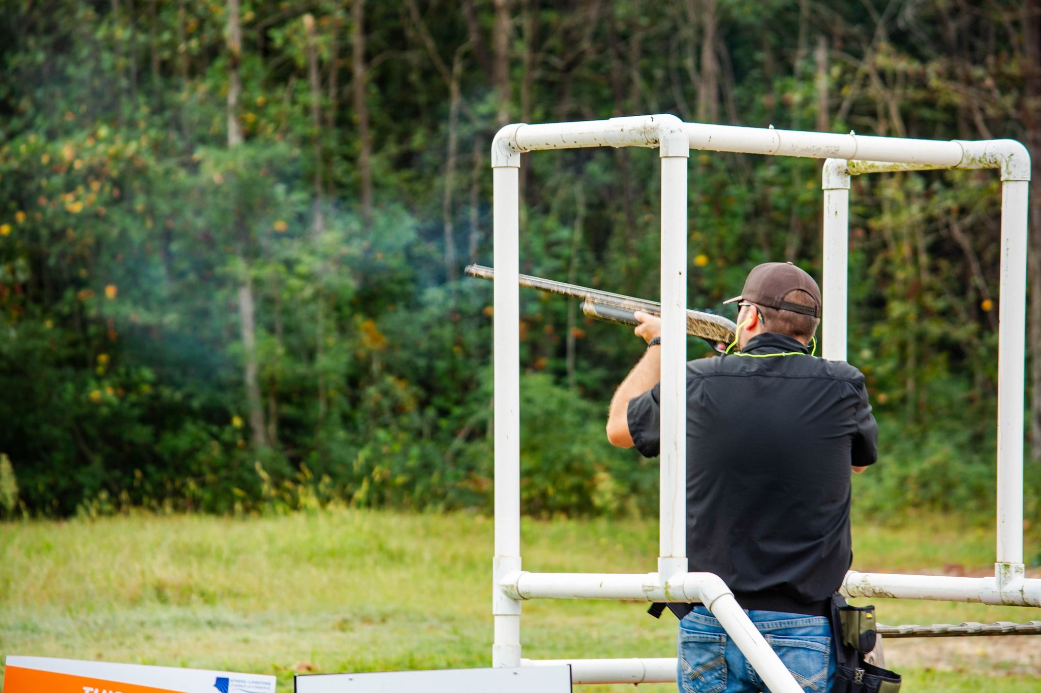 Photo of person shooting clays